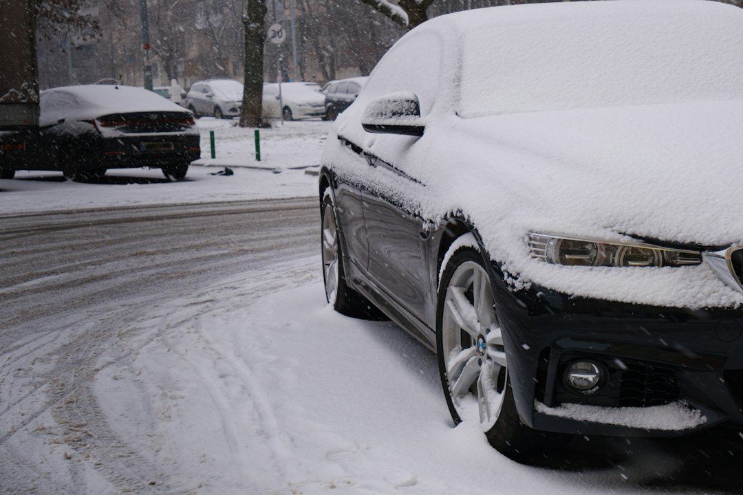 Car covered in snow on a winter street in Mississauga